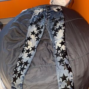 AMIRI Blue Chemist Jeans with Black Star Accen